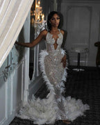 The White Angel - 2026 White Silver Crystal Feather Mermaid Gown: Plunging V-Neckline with Crystal Straps, Open Back & Feather Cathedral Train