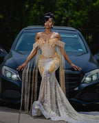 The Golden Empire - 2026 Beaded Mermaid Gown: Off-Shoulder with Dramatic Beaded Fringe Cape & Sheer Mesh Panels