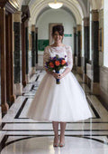 Chic Tulle Ball Gown: Bateau Neck Tea-Length with Lace Accents BM bride
