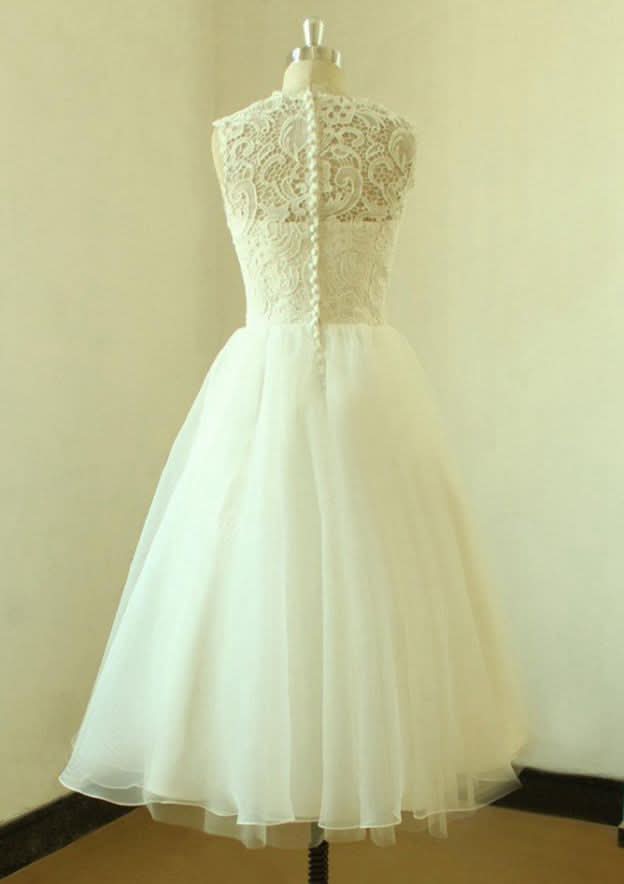 Elegant A-Line/Princess Bateau Sleeveless Tea-Length Organza Wedding Dress with Intricate Lace Details BM bride