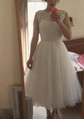 Elegant A-Line/Princess Bateau Sleeveless Tea-Length Organza Wedding Dress with Intricate Lace Details BM bride