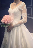 Appliqued Lace A-Line/Princess V-Neck Wedding Dress with Full Long Sleeves and Chapel Train in Satin BM bride