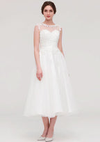 Enchanting A-Line/Princess Tulle Wedding Dress with Illusion Neck, Sleeveless Design, Tea-Length, and Appliqued Beading BM bride