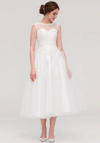 Enchanting A-Line/Princess Tulle Wedding Dress with Illusion Neck, Sleeveless Design, Tea-Length, and Appliqued Beading BM bride