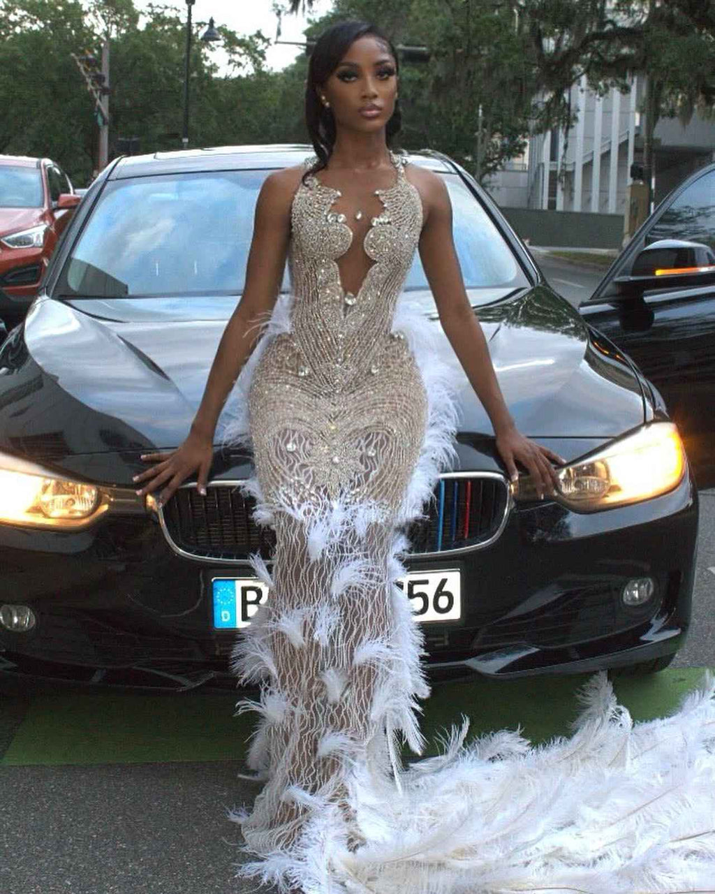 The White Angel - 2026 White Silver Crystal Feather Mermaid Gown: Plunging V-Neckline with Crystal Straps, Open Back & Feather Cathedral Train