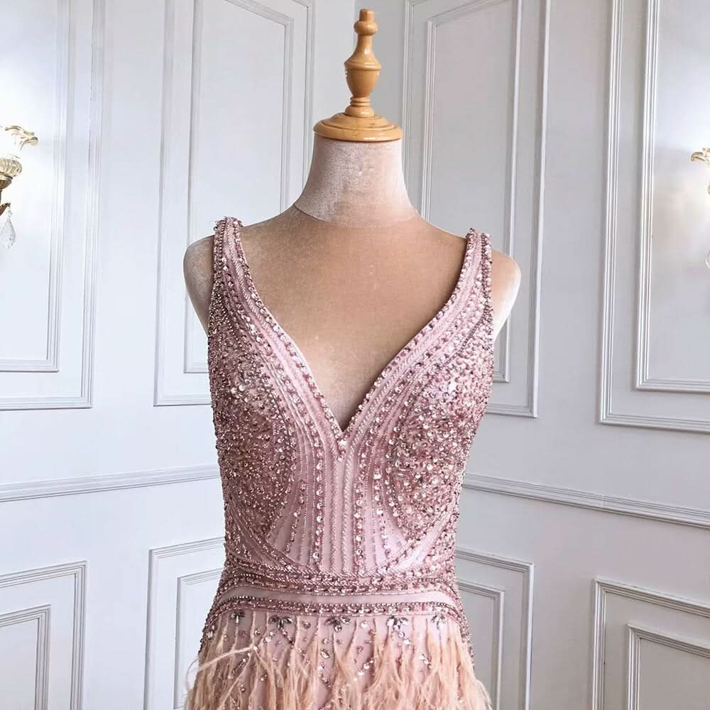 Luxury Pink Beaded Evening Dress with Feather Detail and Mermaid Silhouette BM bride