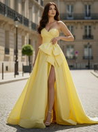 Yellow Strapless Satin Prom Dress with Dramatic Bow and High Slit