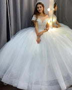 Elegant A-Line Bateau Neck Crystal Train Wedding Dress with Sequins and Tulle BM bride