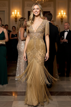 Customer wearing champagne gold beaded fringe evening gown